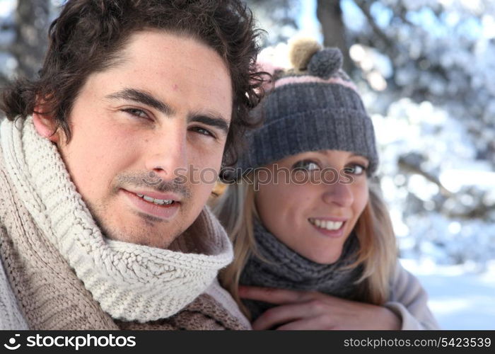 Happy couple on winter walk