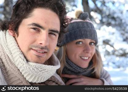 Happy couple on winter walk