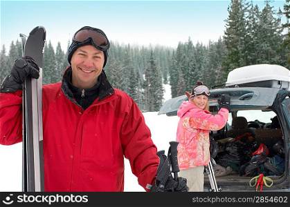 Happy Couple Ready to Go Skiing