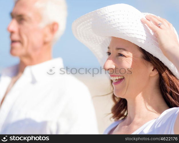 Happy couple together on the beach. Just us and the ocean