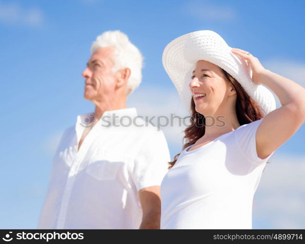 Happy couple together on the beach. Just us and the ocean