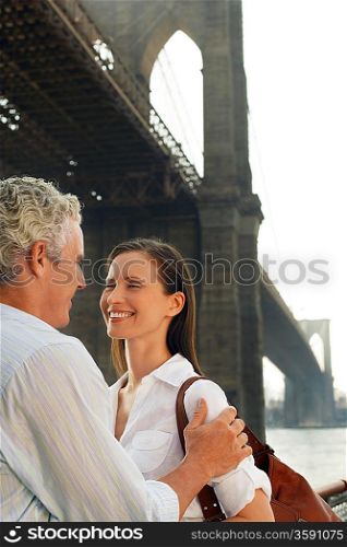 Happy Couple under Bridge