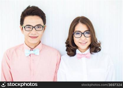 Happy Couples in living room with smart casual dress