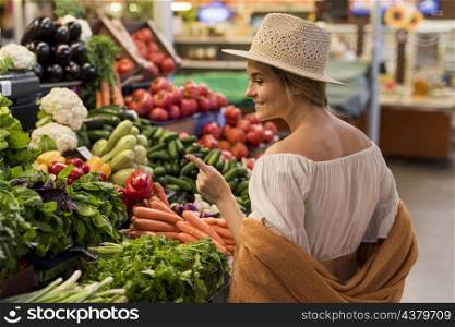 happy customer looking veggies