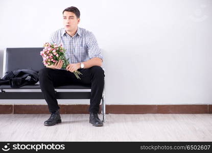 Happy dad waiting for news in maternity house