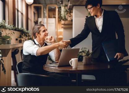 Happy Diversity Business People making Handshake Greeting. Partnership or Teamwork Concept