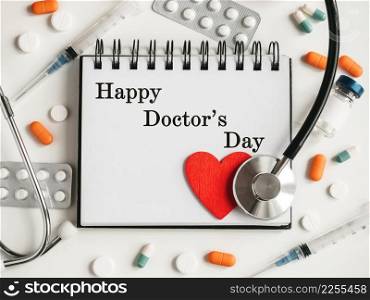 Happy Doctor&rsquo;s Day. Greeting Card. Close-up, view from above, nobody. Concept of preparation for a professional holidays. Congratulations for loved ones, relatives, friends and colleagues. Happy Doctor&rsquo;s Day. Greeting Card. Close-up, top view