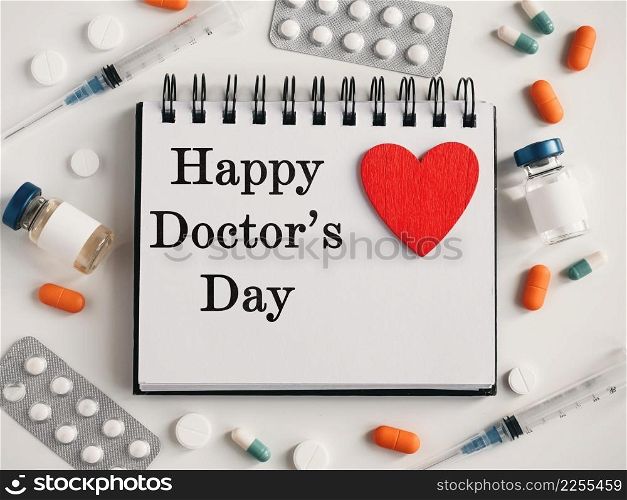 Happy Doctor&rsquo;s Day. Greeting Card. Close-up, view from above, nobody. Concept of preparation for a professional holidays. Congratulations for loved ones, relatives, friends and colleagues. Happy Doctor&rsquo;s Day. Greeting Card. Close-up, top view