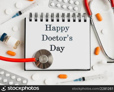 Happy Doctor&rsquo;s Day. Greeting Card. Close-up, view from above, nobody. Concept of preparation for a professional holidays. Congratulations for loved ones, relatives, friends and colleagues. Happy Doctor&rsquo;s Day. Greeting Card. Close-up, top view