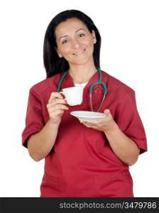 Happy doctor woman having a cup of coffee isolated on white background