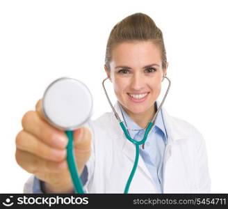 Happy doctor woman listening with stethoscope