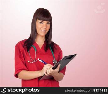 Happy doctor woman with clipboard isolated on red background