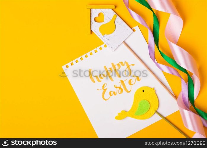 happy easter card. beautiful Easter egg Pysanka handmade - ukrainian traditional on a yellow background