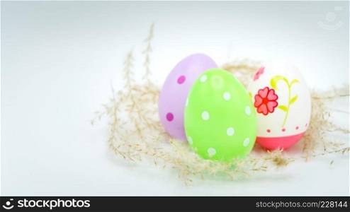 Happy easter, colorful easter egg on white backgrounds, easter holiday decorations, easter concept backgrounds