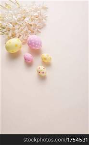 Happy Easter day eggs and flower on paper background with copy space.