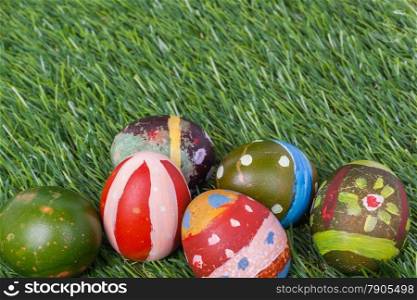 Happy easter eggs group on grass,can use as background for god festival