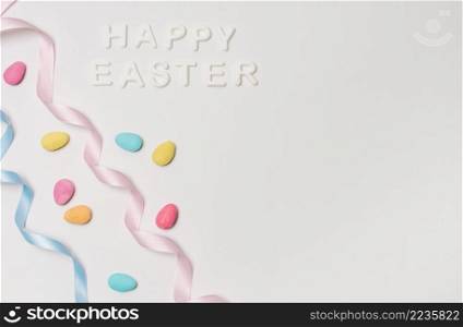 happy easter title near set bright little stones bands