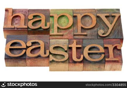 happy easter- words in vintage wooden letterpress printing blocks, stained by color inks, isolated on white