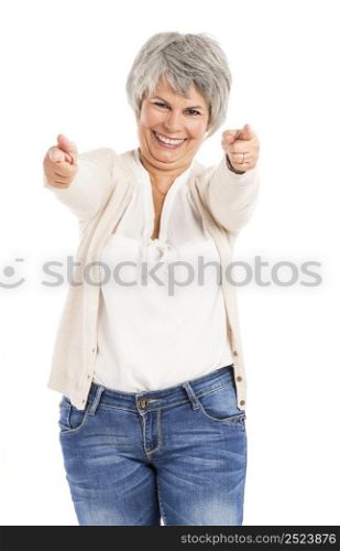 Happy Elderly woman looking and pointing to the camera