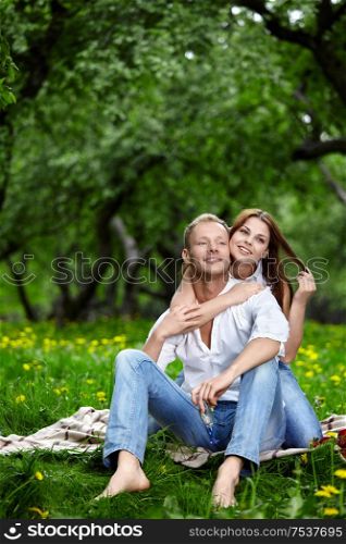 Happy enamoured couple in wood