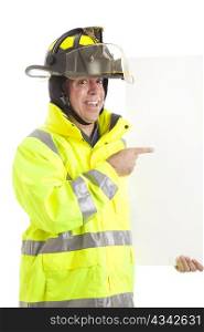 Happy, enthusiastic firefighter holding blank white sign. Ready for text.