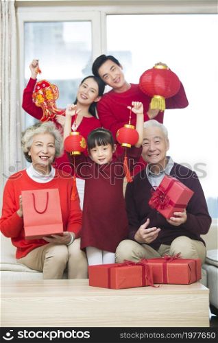 Happy families congratulating the new year