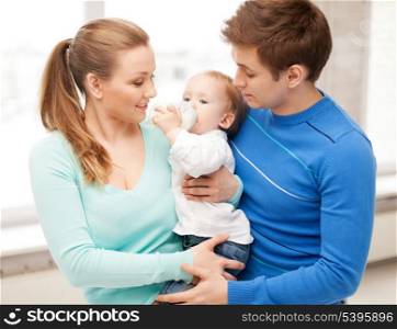 happy family and adorable baby with feeding-bottle