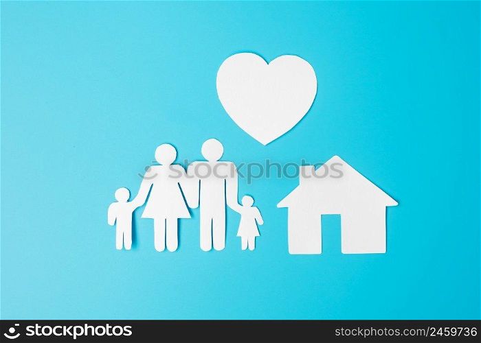 Happy Family day. paper shape cutout with Father, Mother, Children, Home and Heart. international day of families, Warm home, love, Insurance, Life and Wellness concepts.