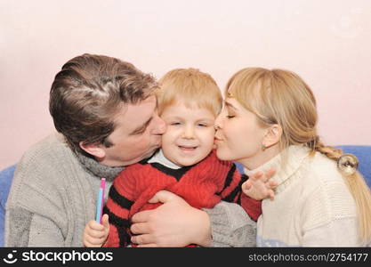 Happy family. Family from three person in house conditions