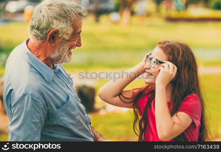 Happy family go vacation on weekend in the garden park in summer. Kid education and family activities concept.