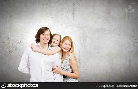 Happy family. Happy family portrait of mother father and daughter