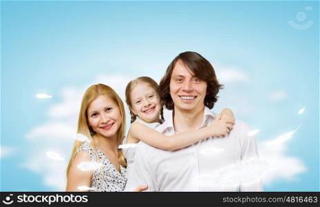 Happy family. Happy family portrait of mother father and daughter