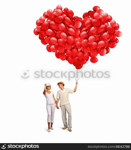 Happy family. Image of young happy family with bunch of balloons