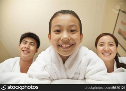 Happy Family in Bed - Close-up of Daughter