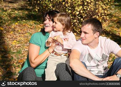 happy family in the park in autumn 2