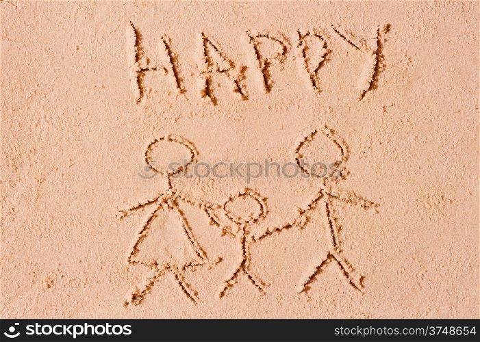 happy family is drawn in the sand