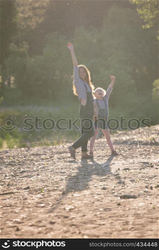 happy family - Mother and daughter on a walk