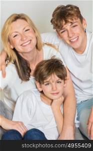 Happy Family Mother Mom and Two Male Boy Sons Children