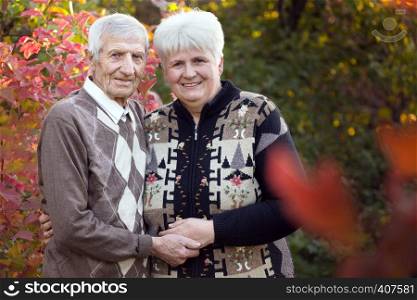 happy family. portrait of smiling senior man and daughter