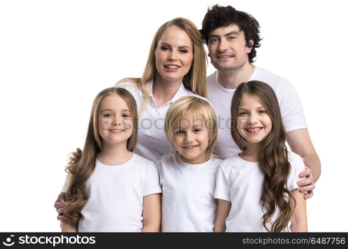 Happy family portrait. Portrait of happy smiling family of two parents and three children isolated on white background