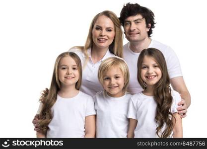 Happy family portrait. Portrait of happy smiling family of two parents and three children isolated on white background