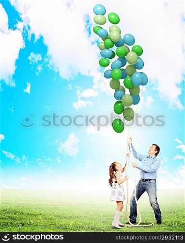 Happy family with balloons