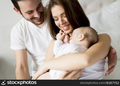 Happy family with newborn baby