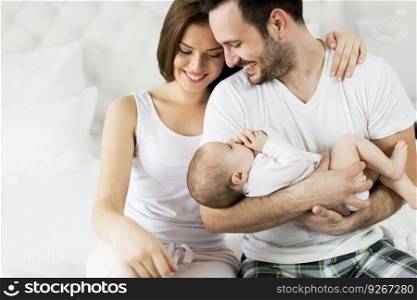 Happy family with newborn baby