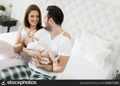 Happy family with newborn baby