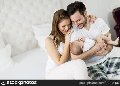 Happy family with newborn baby