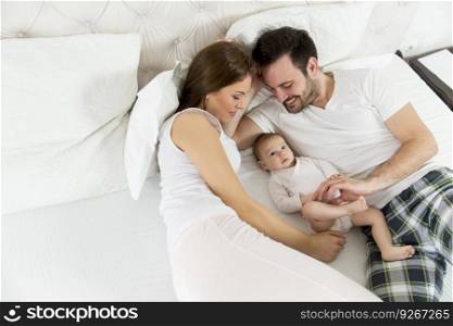 Happy family with≠wborn baby