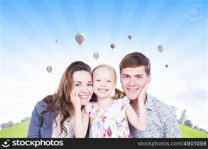 happy family. Young happy family of father mother and daughter