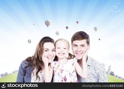 happy family. Young happy family of father mother and daughter