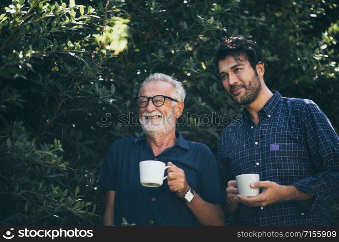 Happy Father and son with coffee cup